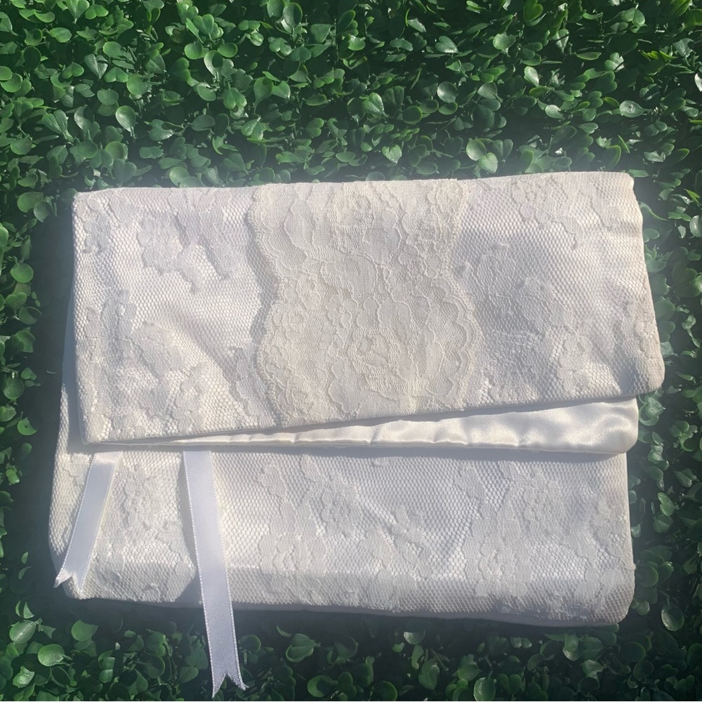 Vintage pearl white synthetic acetate satin lace covered fold over case rosettes
